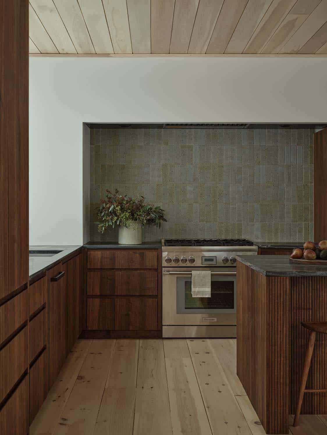 modern kitchen with dark brown cabinets 