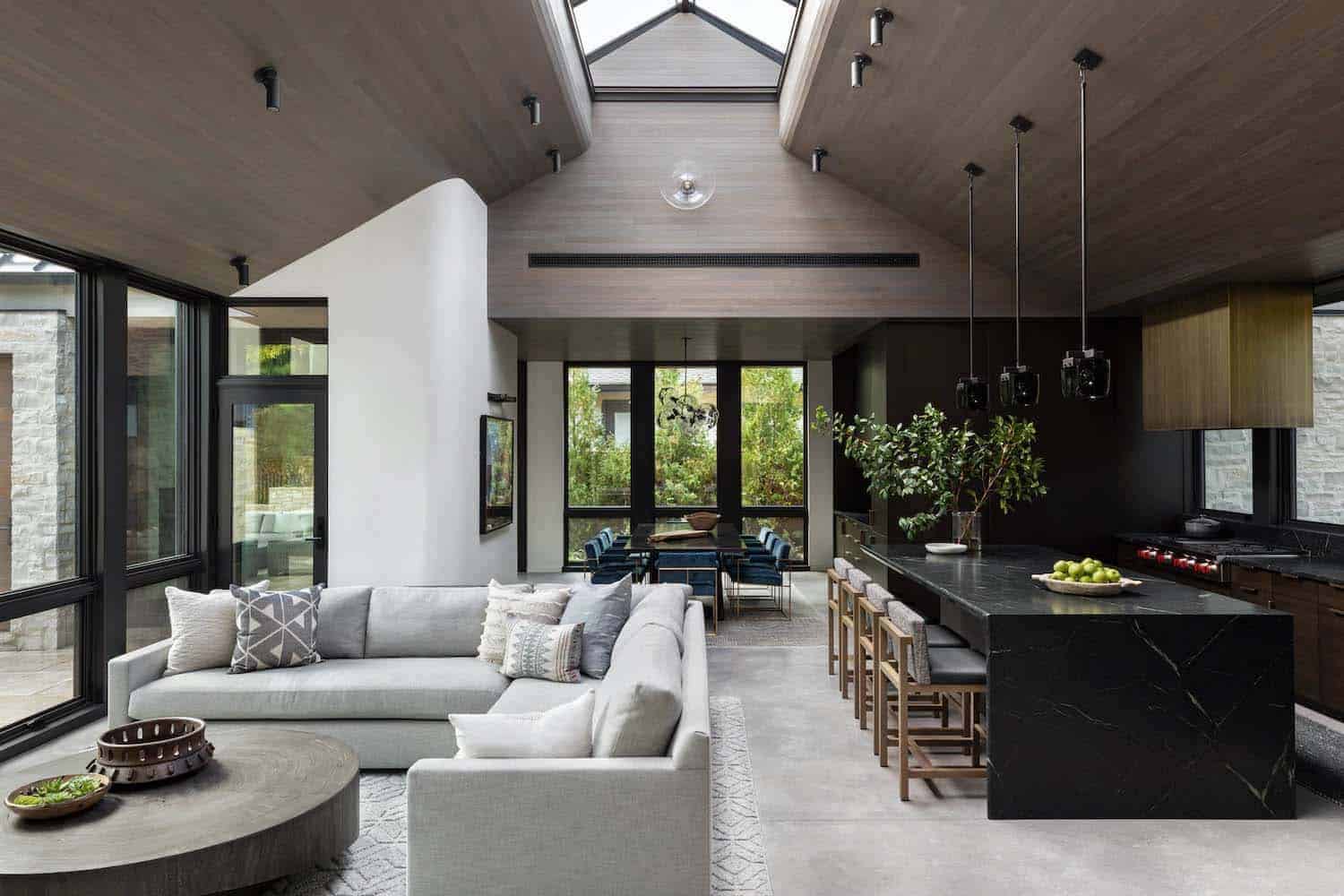 mountain-inspired great room with a large skylight