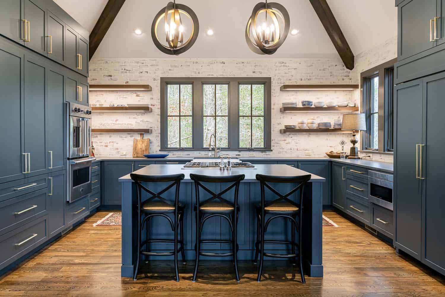 old world craftsman style kitchen with blue cabinets 