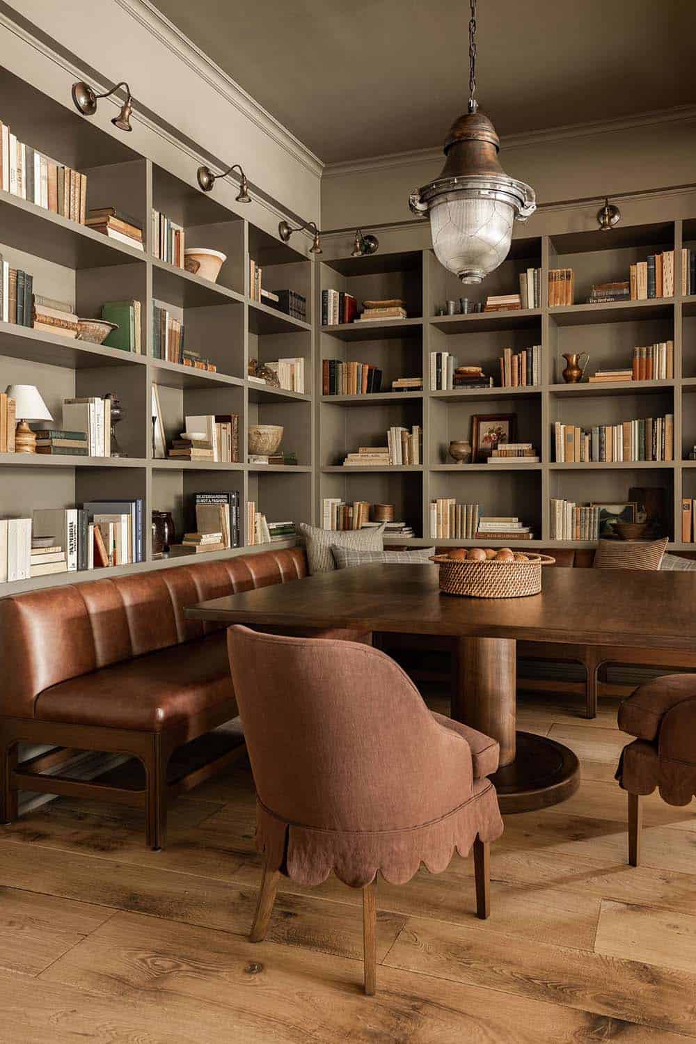 modern breakfast room with a home library