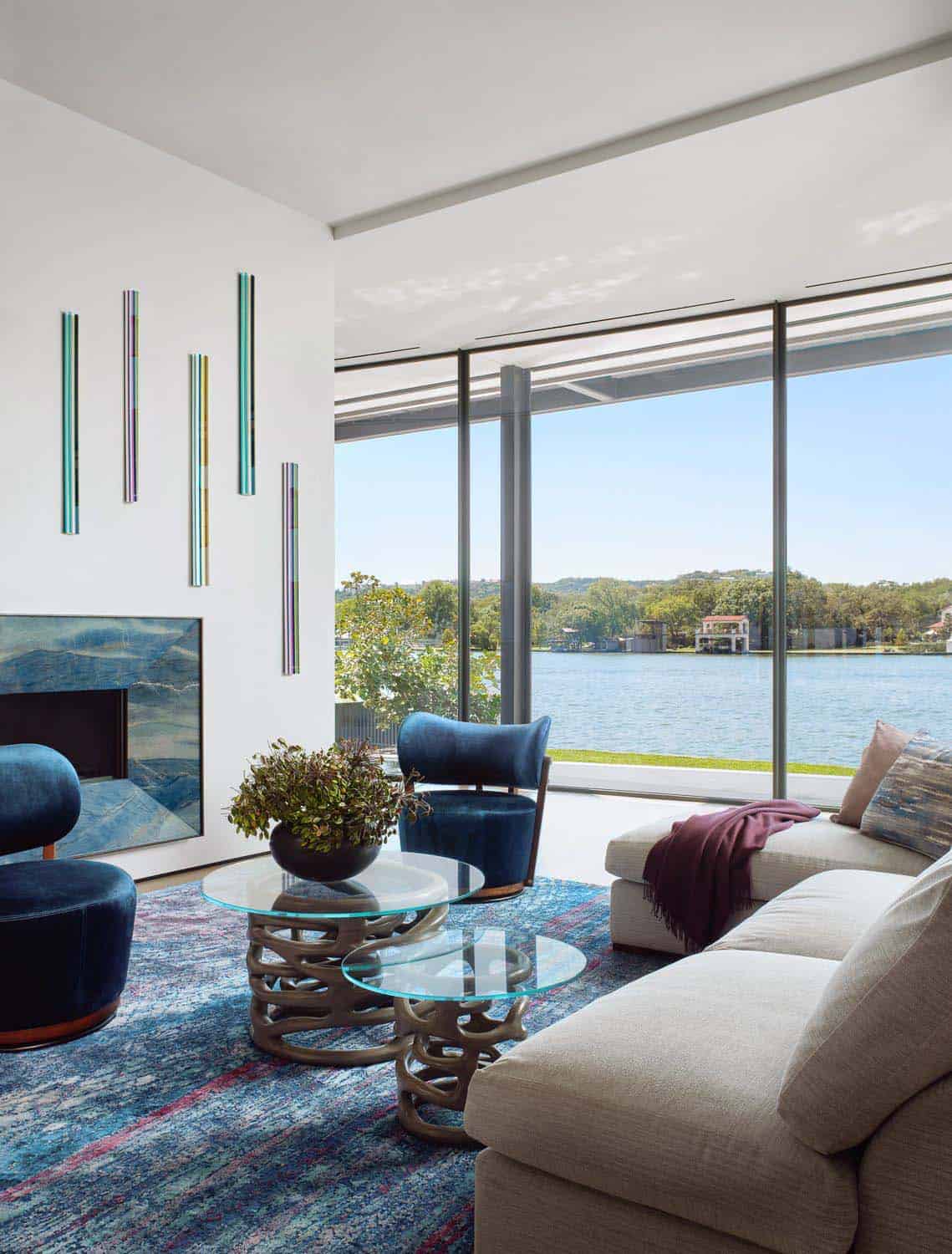 modern living room with a window view of the lake