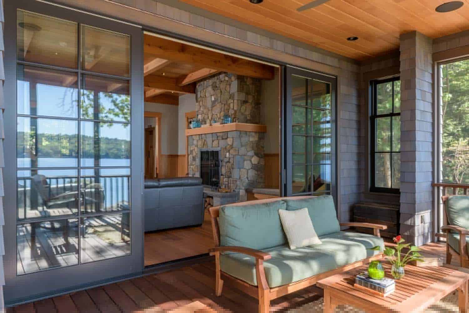 rustic screened porch with outdoor furniture