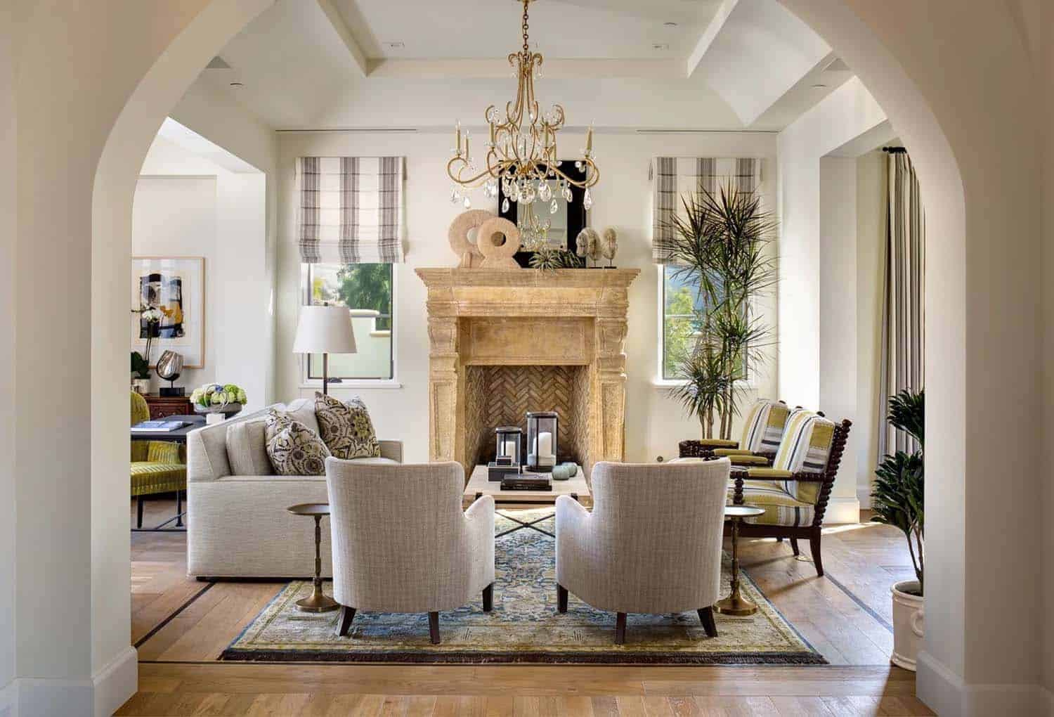 spanish revival style living room with a fireplace