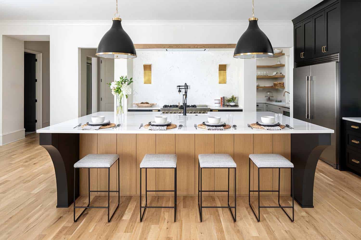 contemporary kitchen with a large island and pendant lights