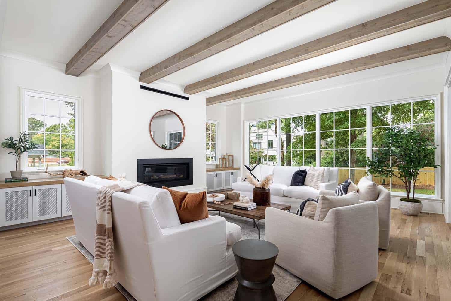 contemporary living room with wood ceiling beams