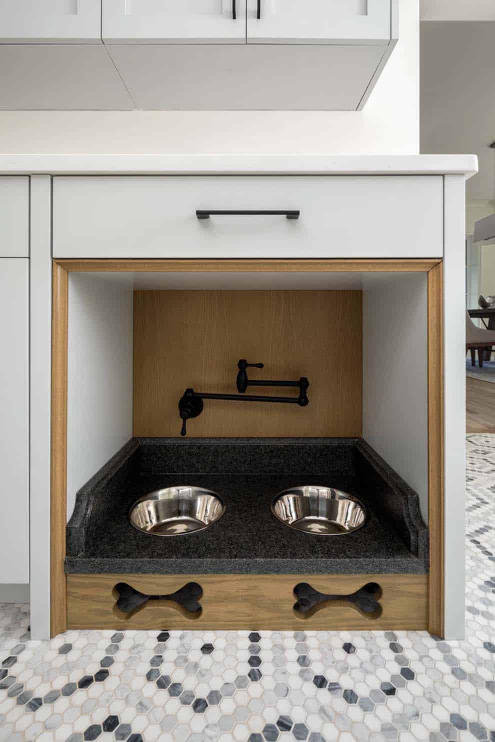 contemporary mudroom with a dog feeding station