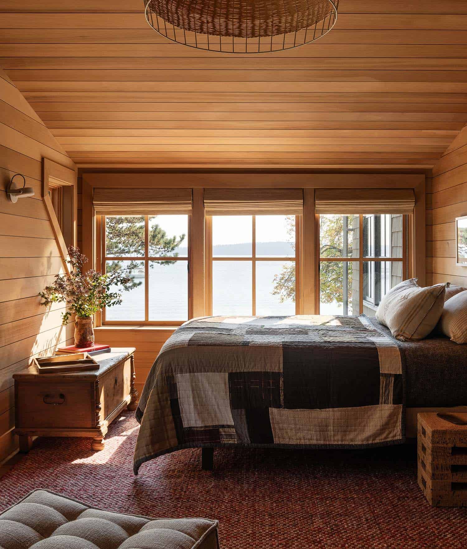 beach style cedar clad bedroom with a large window