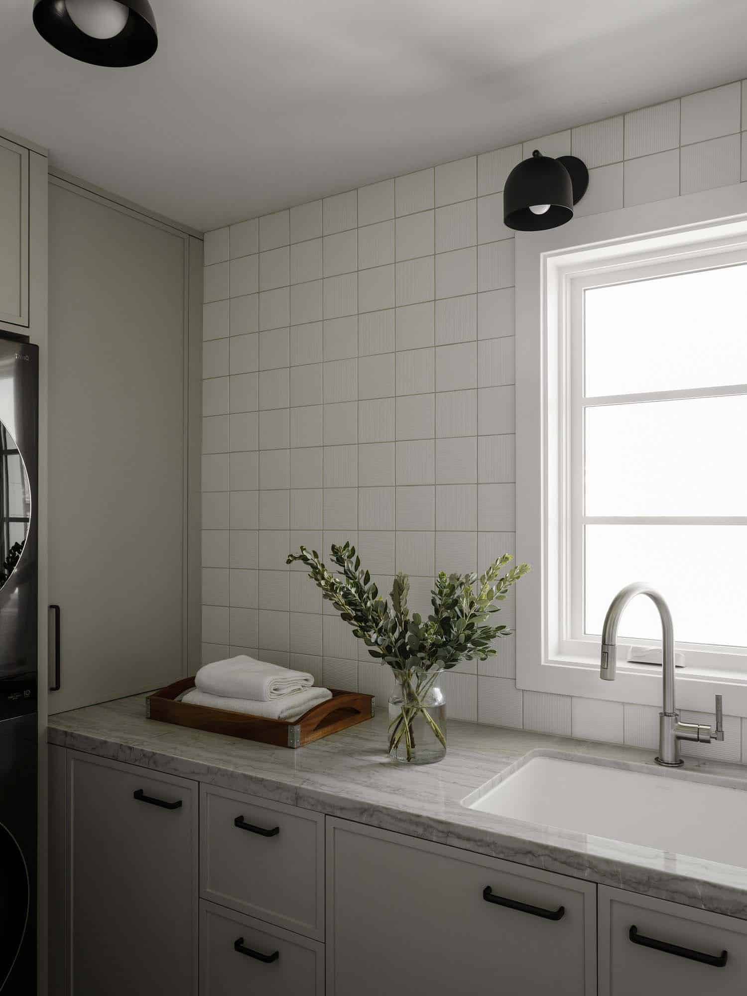 traditional laundry room with a sink