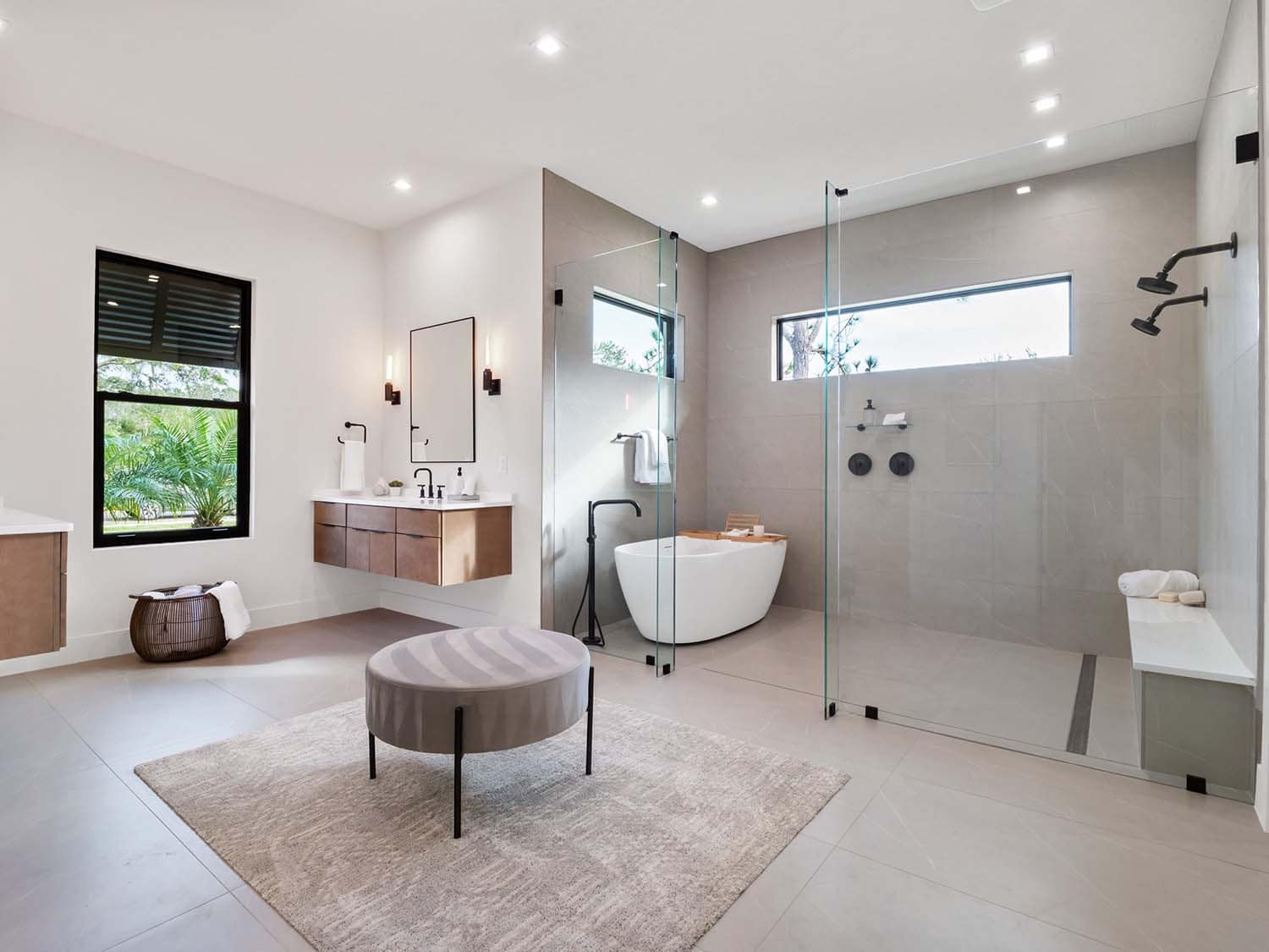 modern bathroom with a walk-in shower and freestanding tub