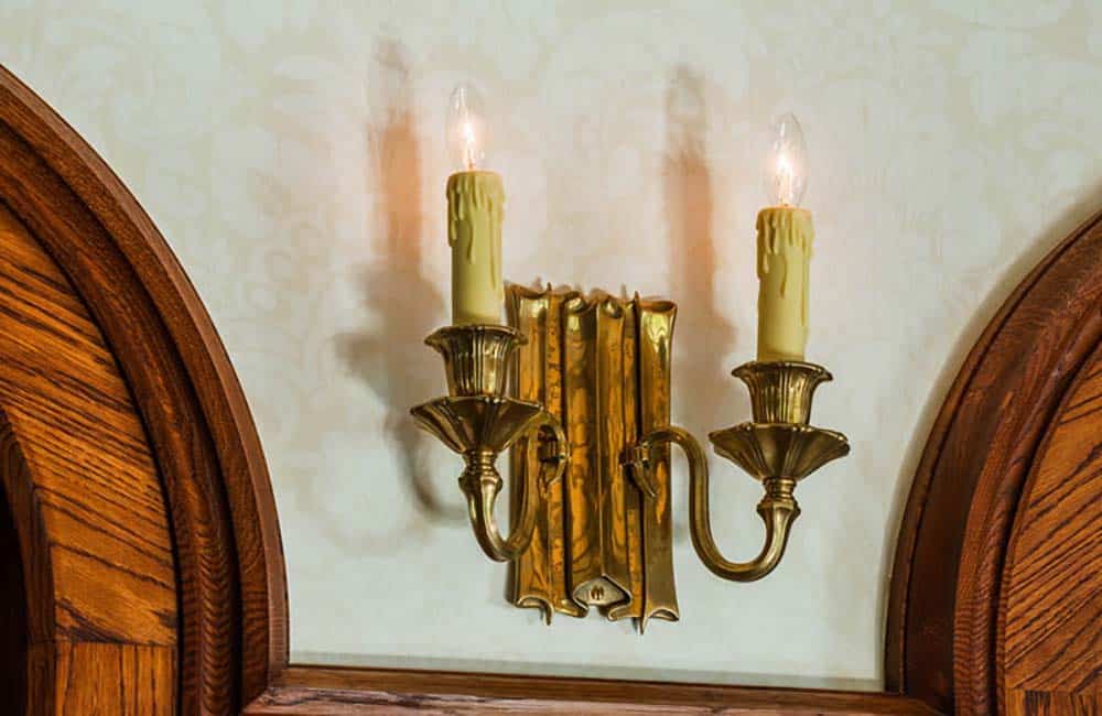 wall sconce detail in a tudor home