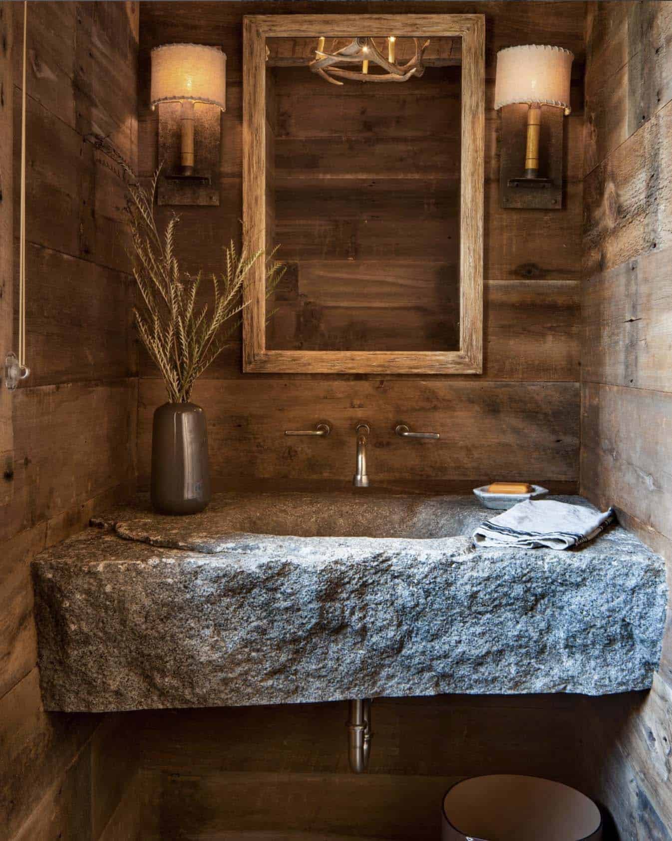 rustic bathroom with a stone vanity