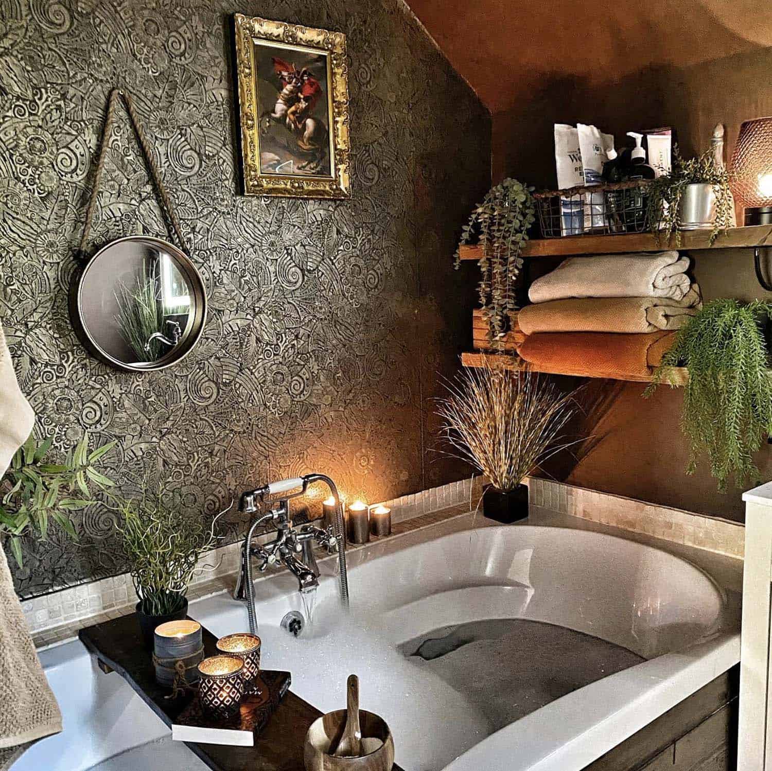 dark and moody rustic bathroom with a soaking tub