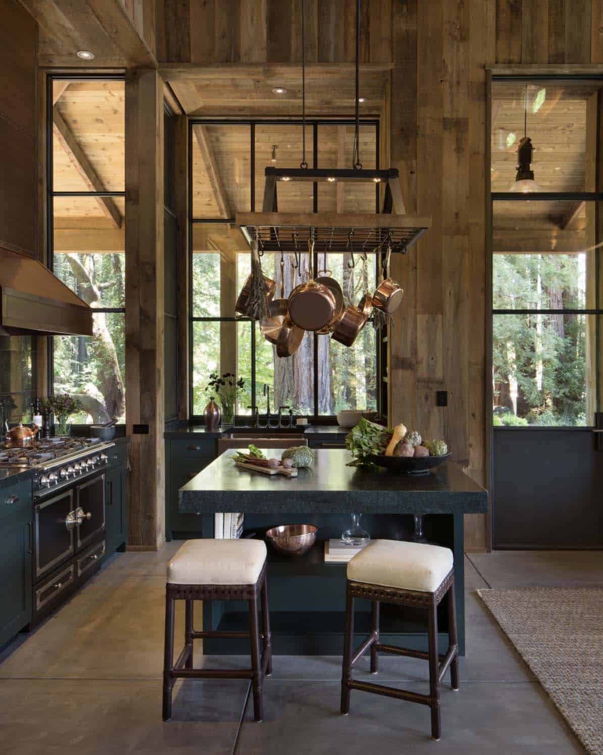rustic kitchen with a hanging pot rack over the island