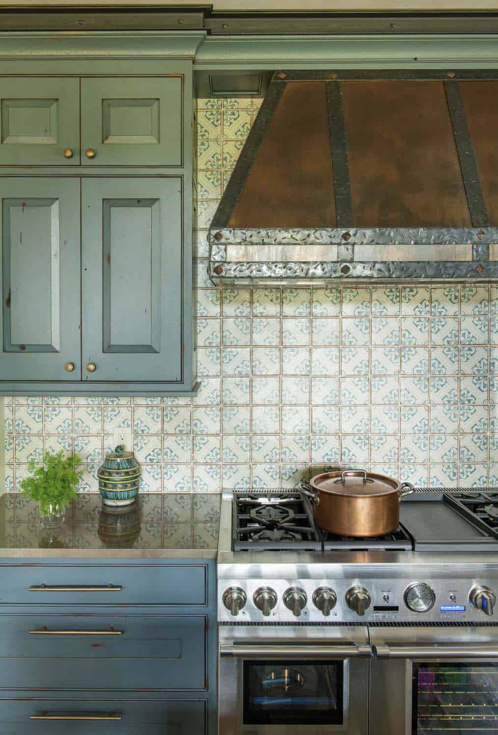 rustic kitchen with a patterned backsplash tile