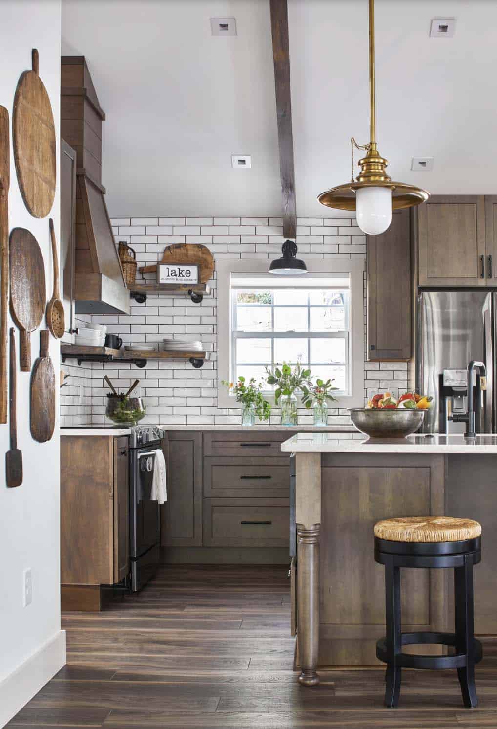 rustic modern kitchen with open shelves and white subway tile backsplash