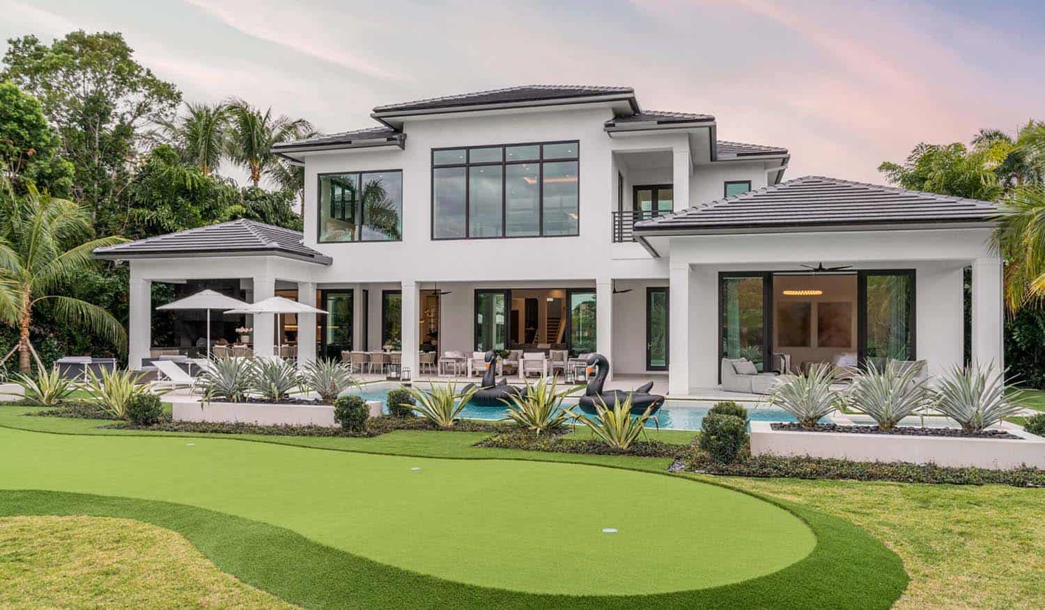 California modern style home exterior with a putting green