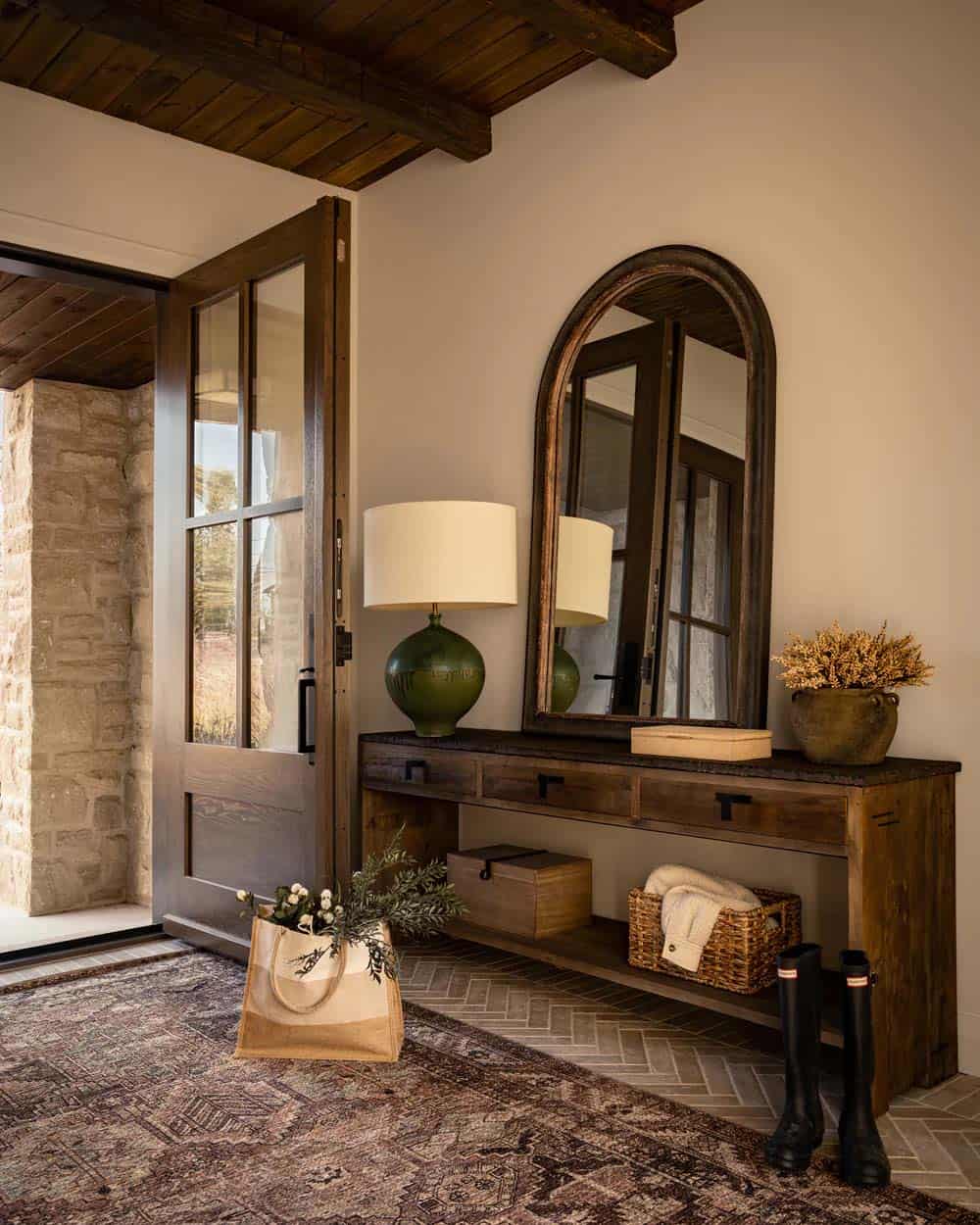 contemporary home entry with a console table