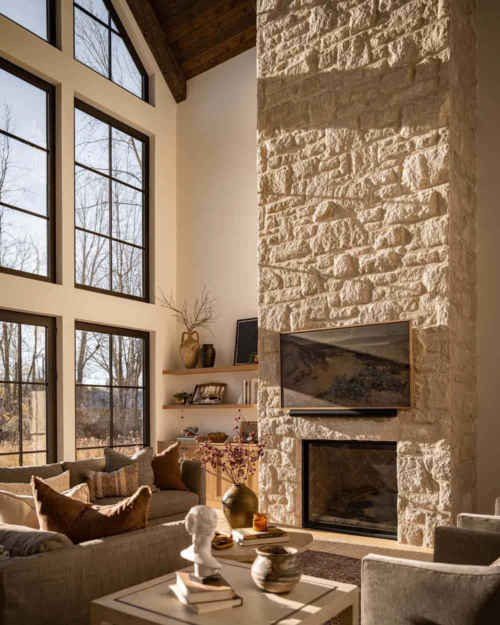 contemporary living room with a natural limestone fireplace
