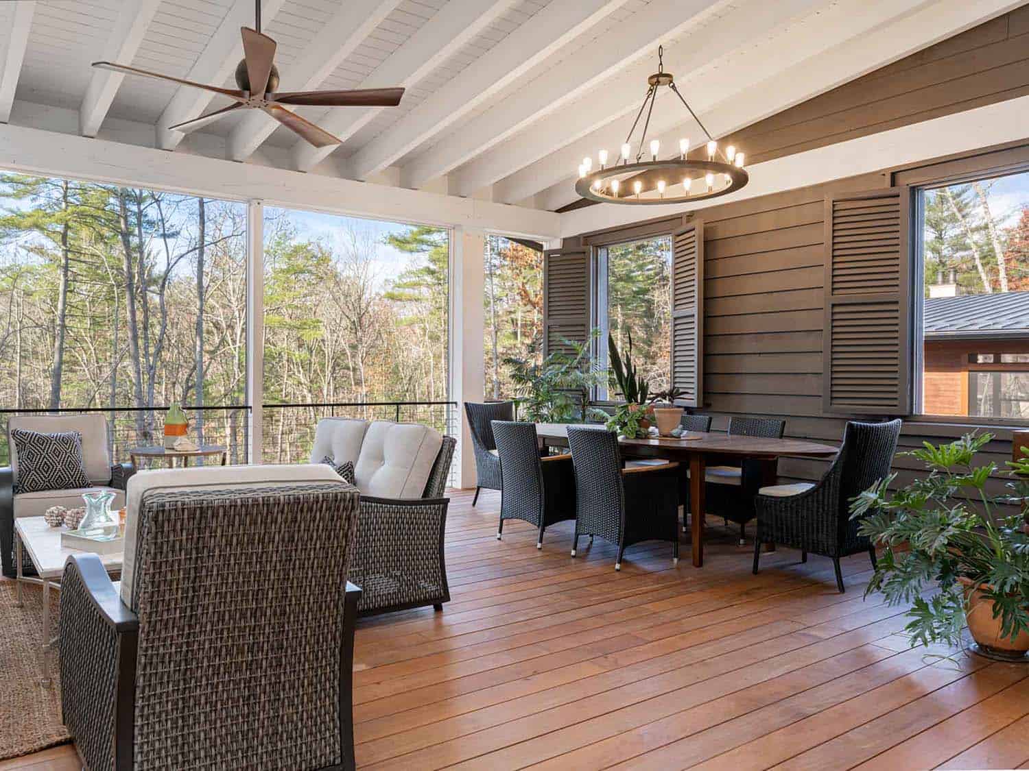 contemporary farmhouse style screened porch with a dining and living room