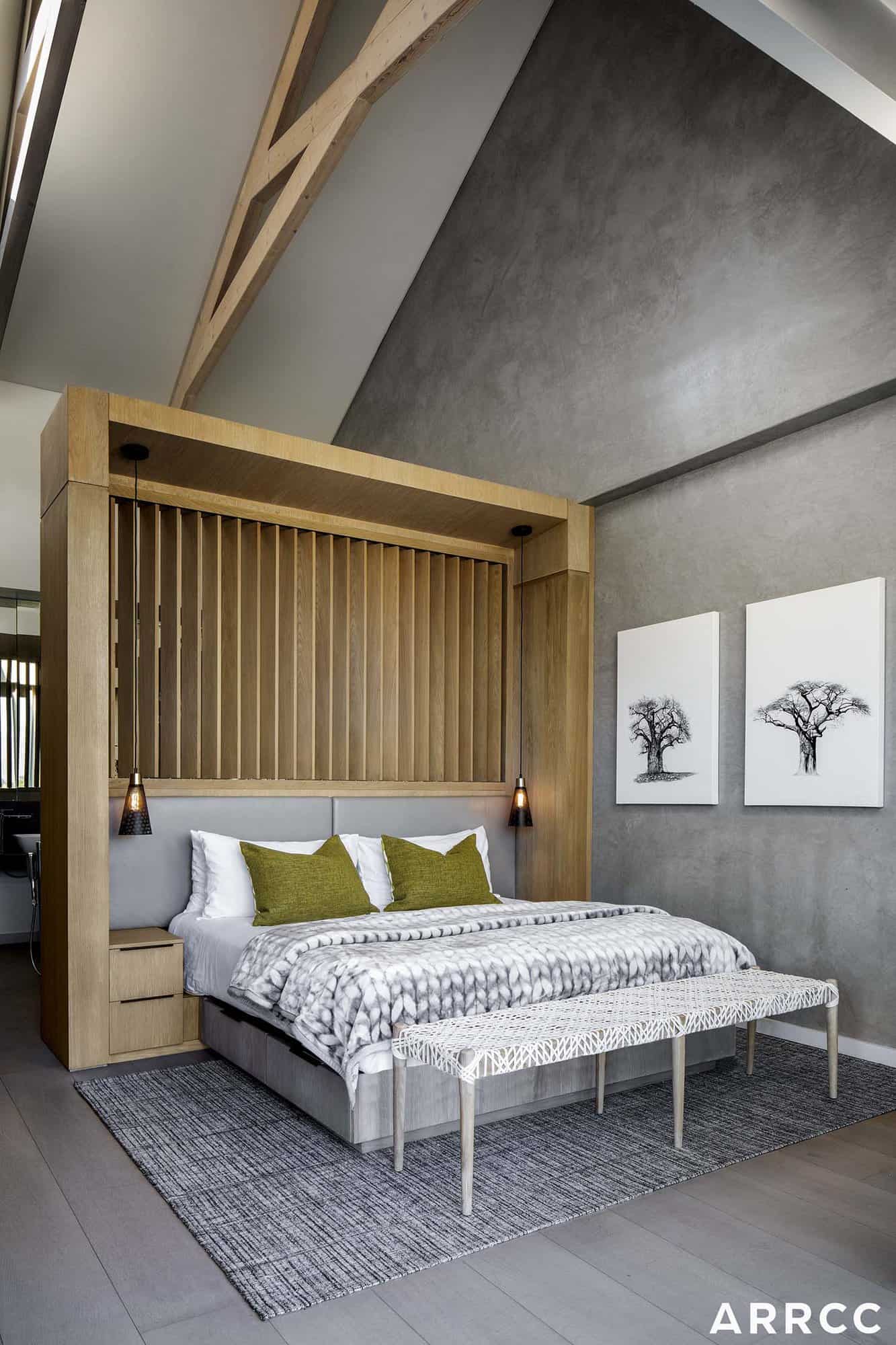 contemporary guest bedroom with a pitched roof