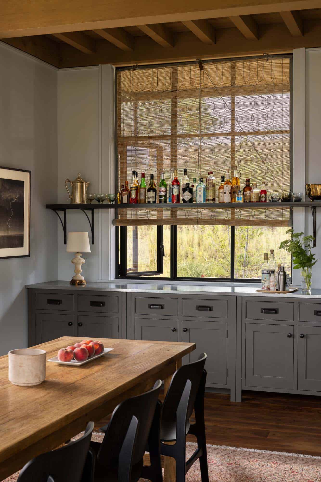 contemporary dining room with a home bar
