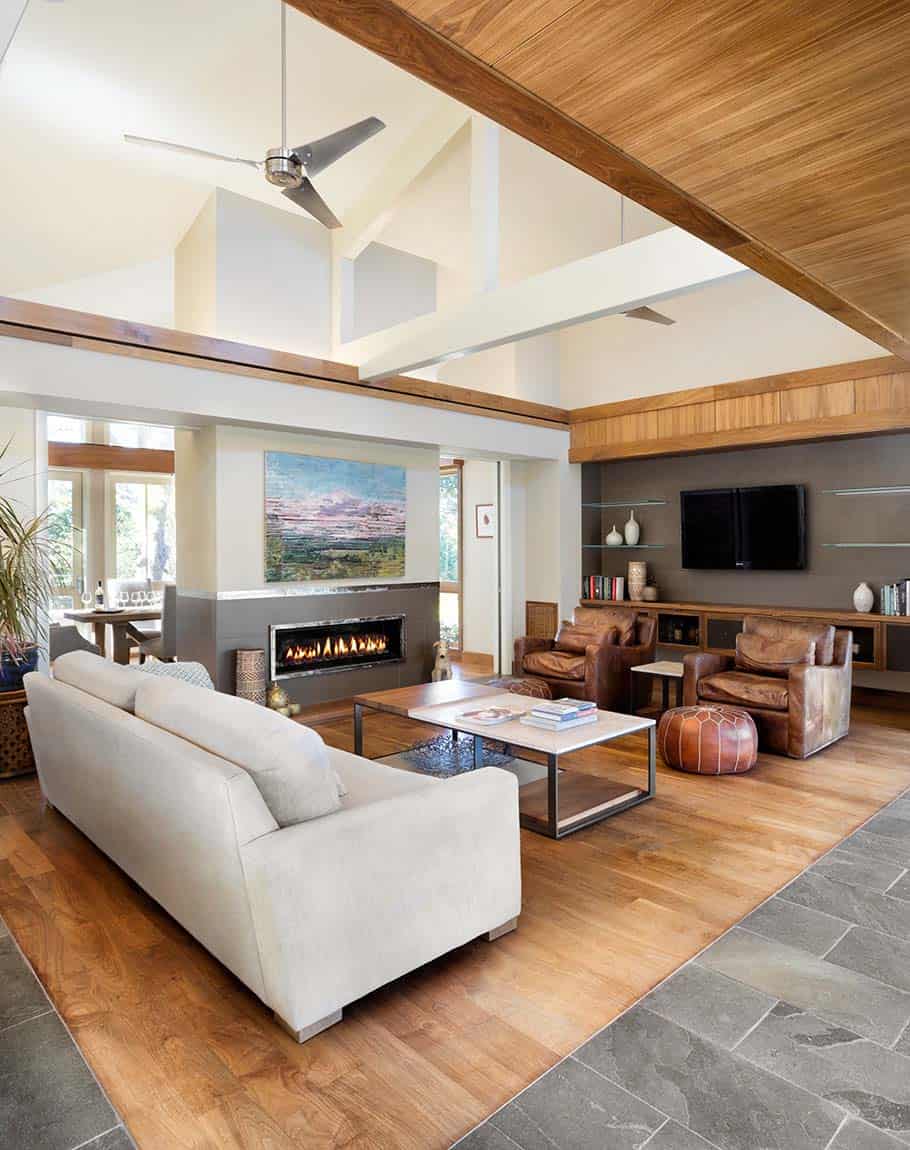 contemporary ranch style living room with a fireplace