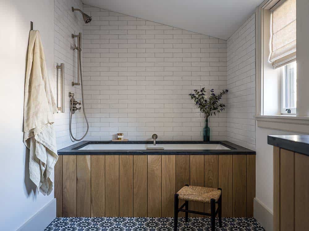 modern farmhouse bathroom with an integrated tub and shower
