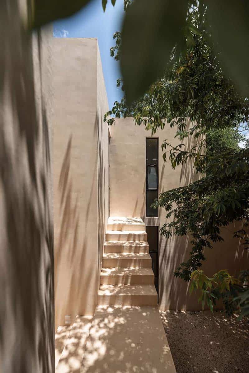 historic home exterior with a staircase in Mexico