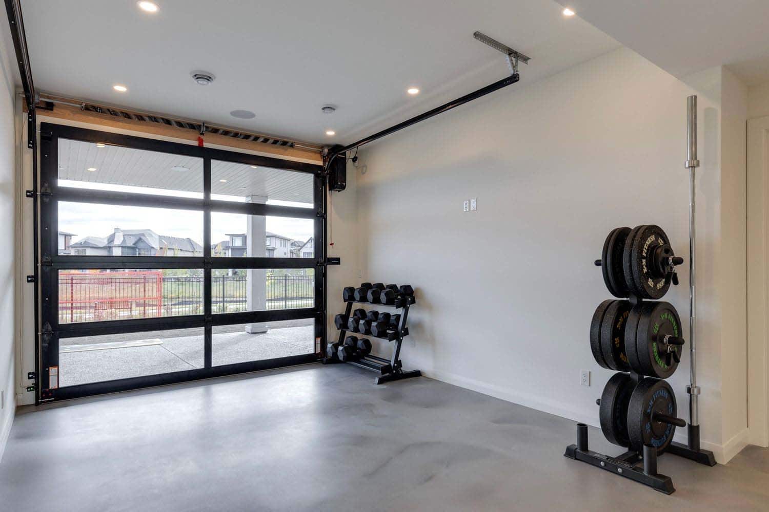 contemporary garage with a home gym