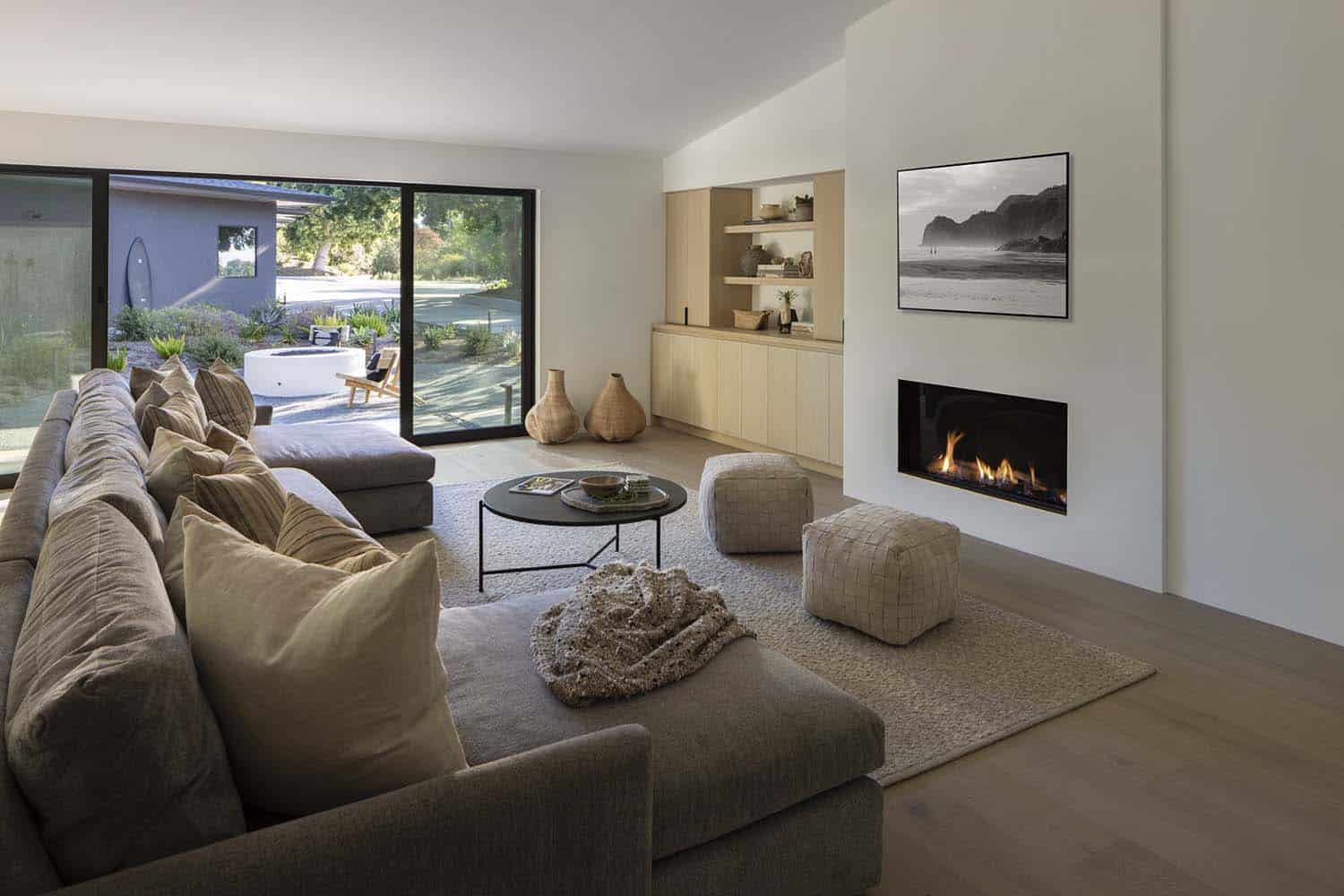 midcentury modern family room with a fireplace