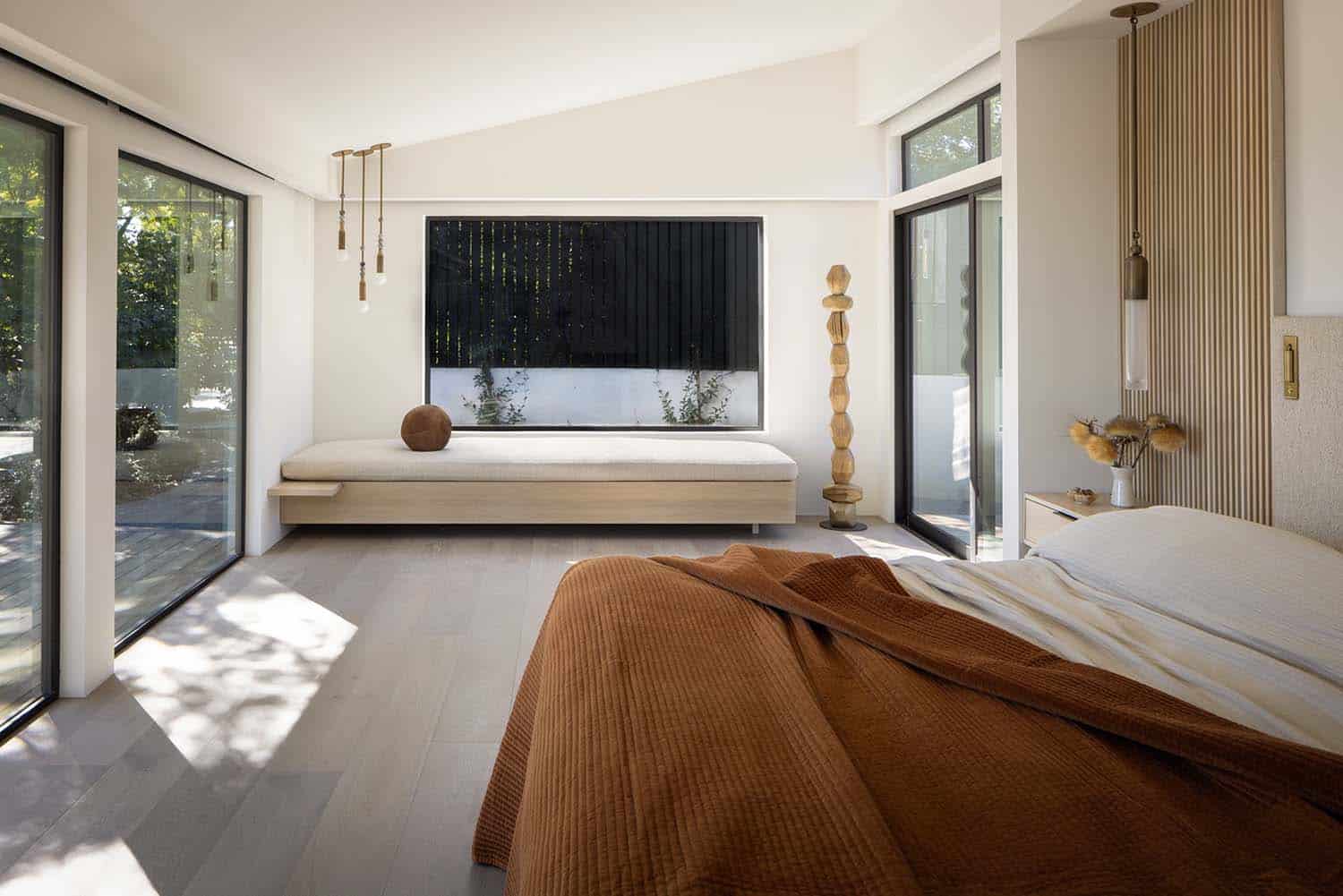 midcentury modern bedroom with a window seat