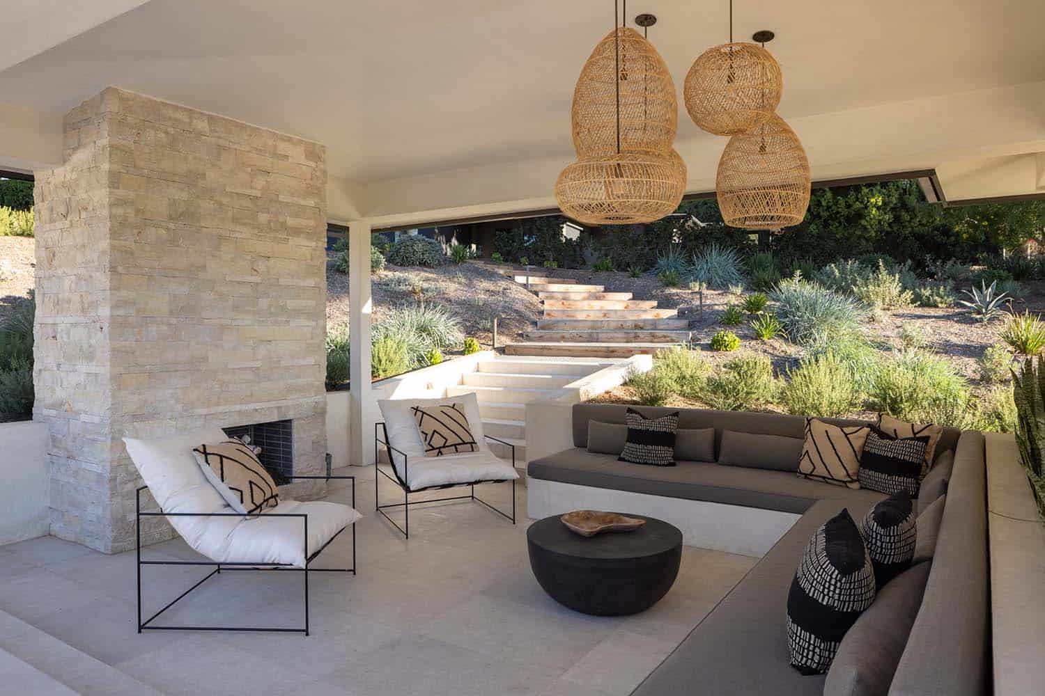 midcentury modern covered patio with outdoor furniture