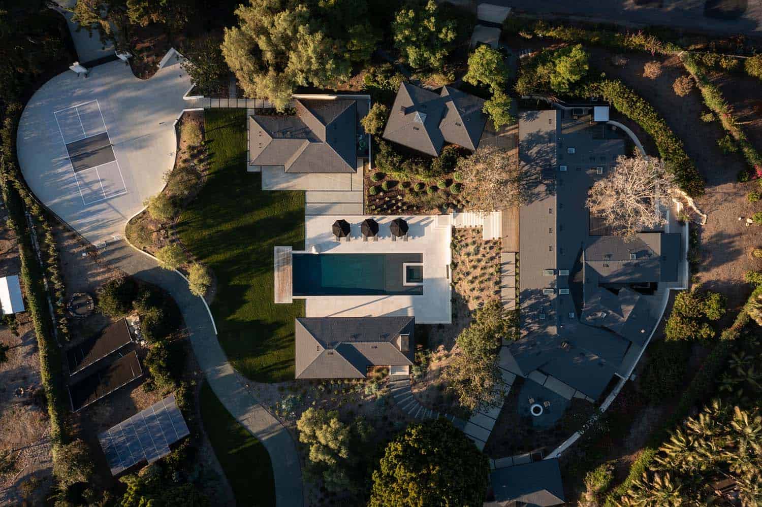 midcentury modern home backyard with a pool aerial view