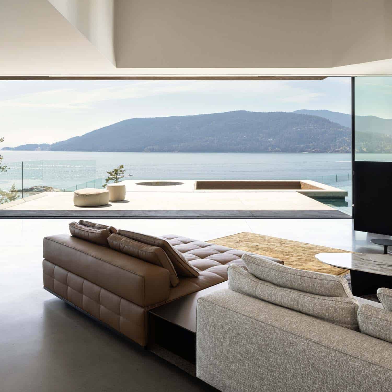 modern living room with a water view