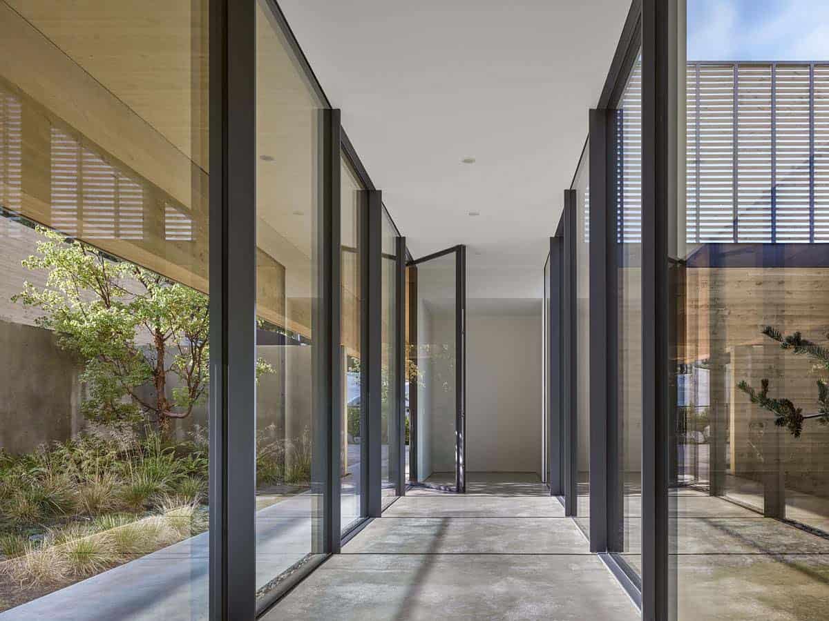 modern hallway with glass on either side