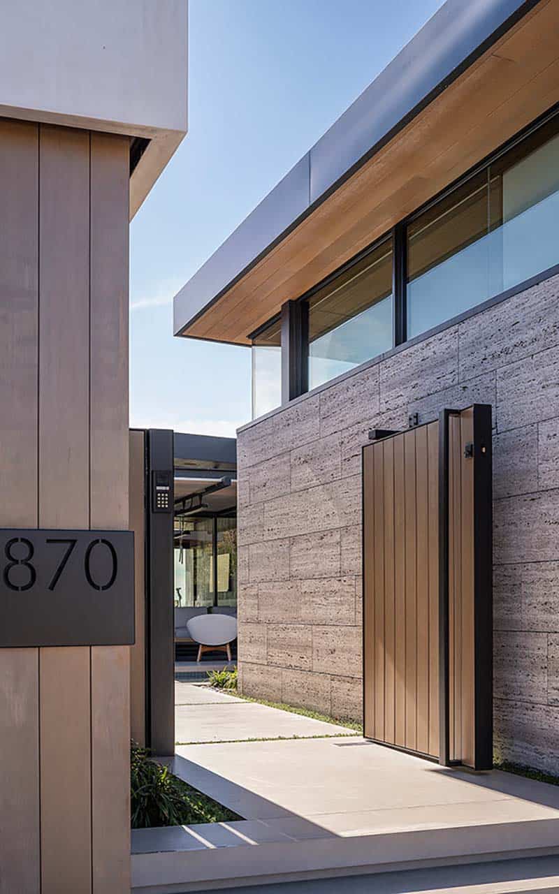 modern home exterior with a entry gate