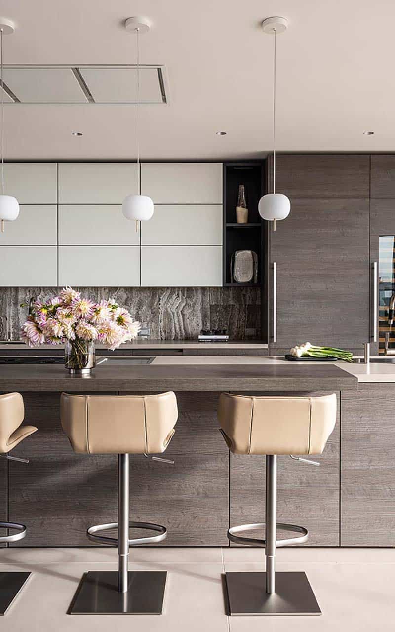 modern kitchen with a large island and pendant lights