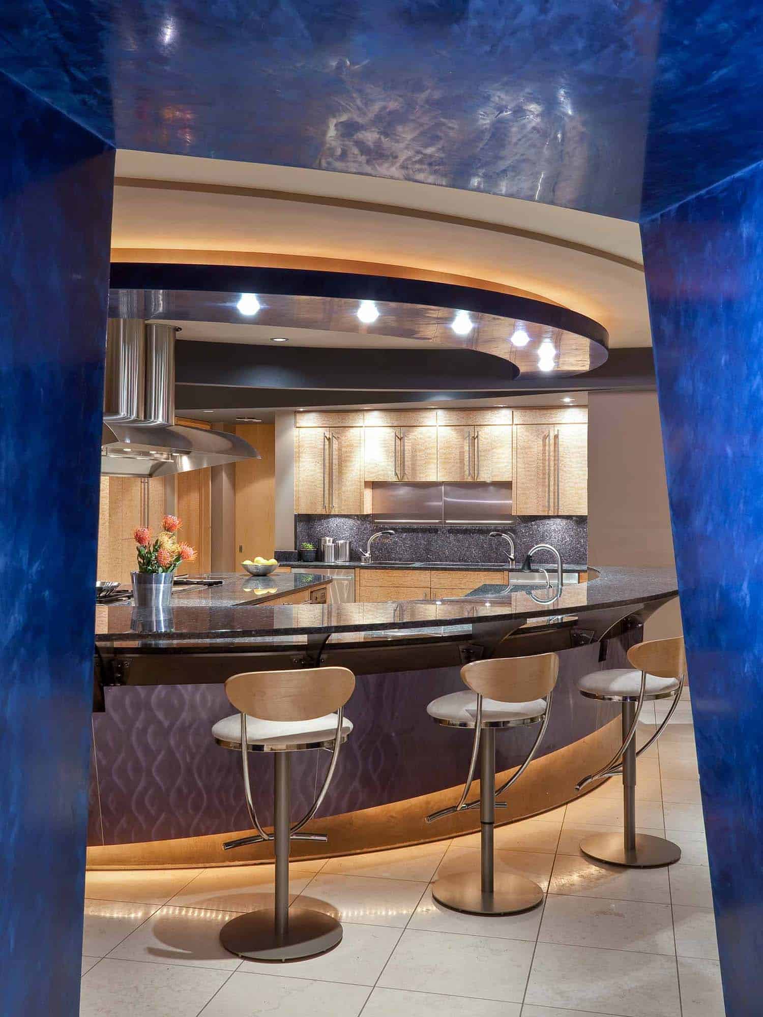 modern kitchen with a curved bar top