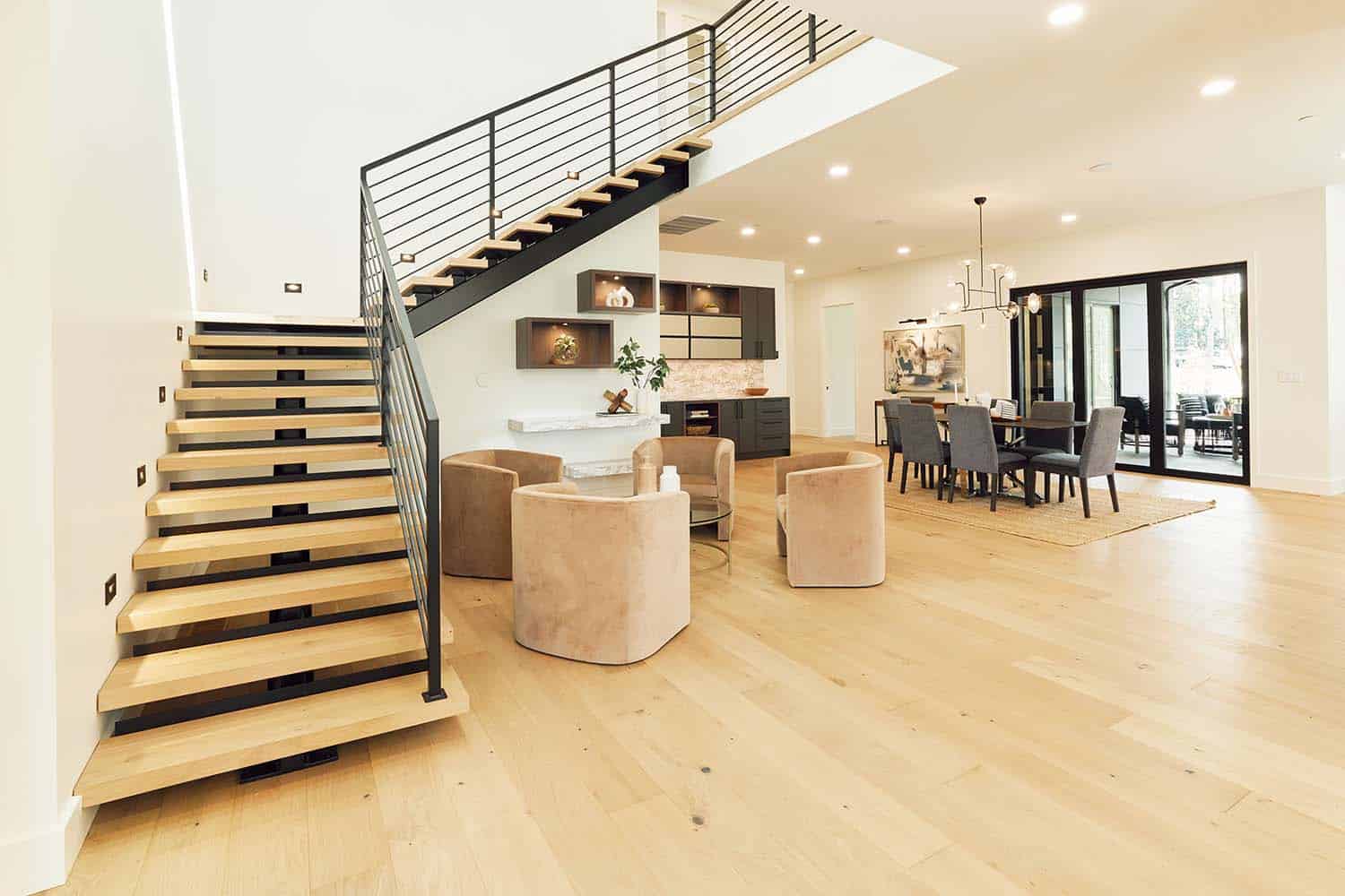 modern staircase with seating under the stairs