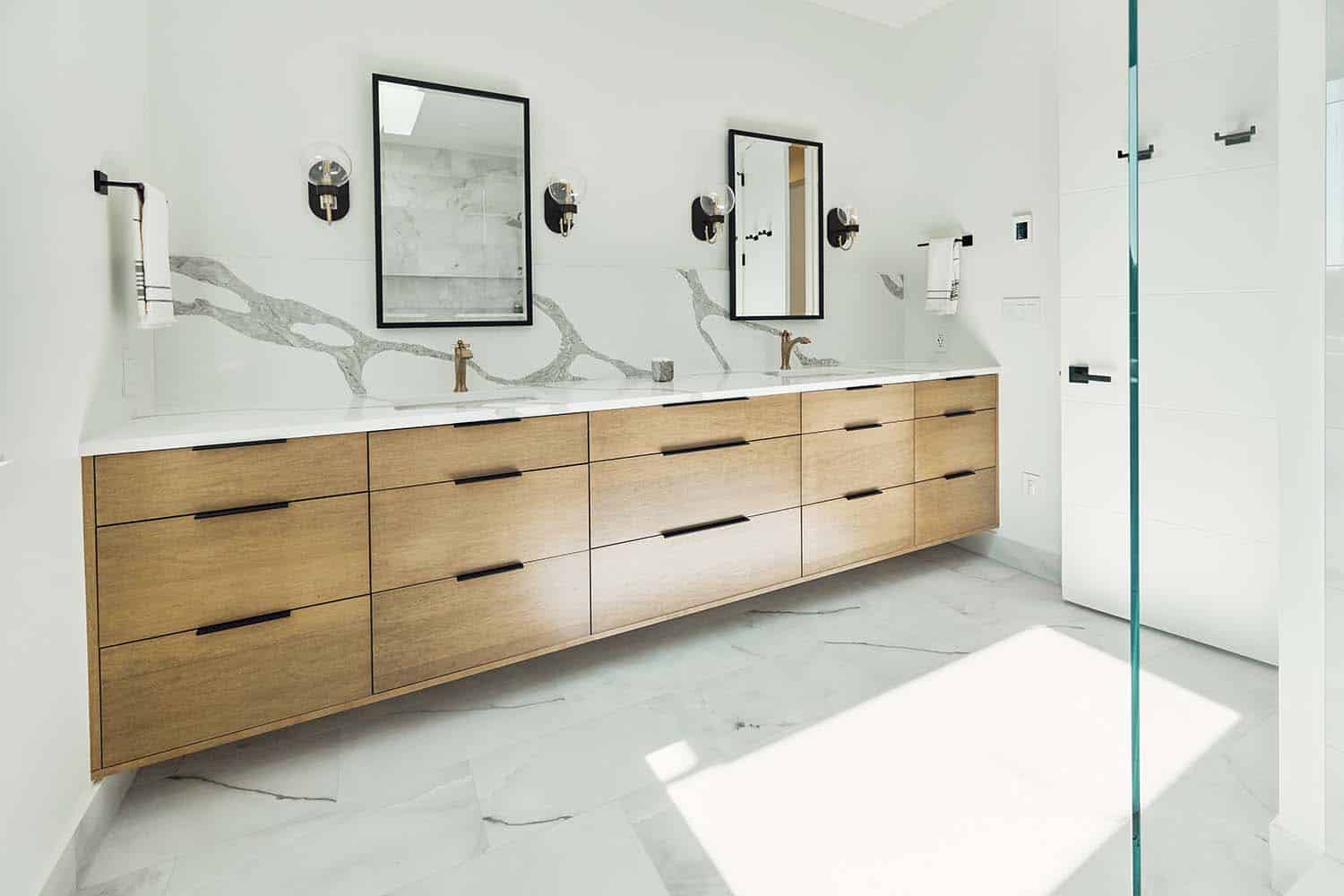 modern bathroom vanity with dual sinks and mirrors