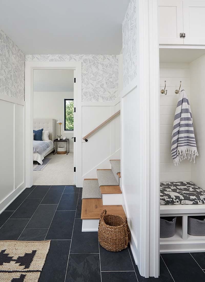modern farmhouse staircase and entry hall into the bedroom