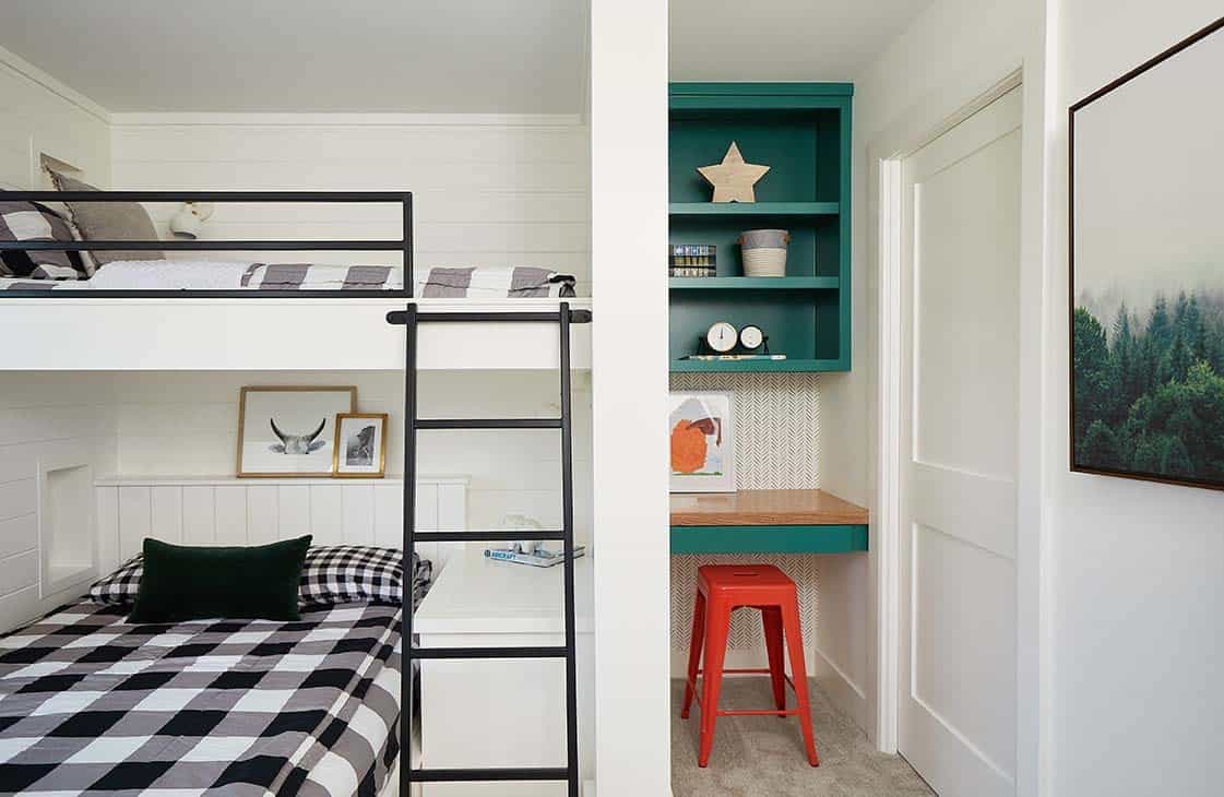 modern farmhouse boys bunk bedroom with a built-in desk and open shelves