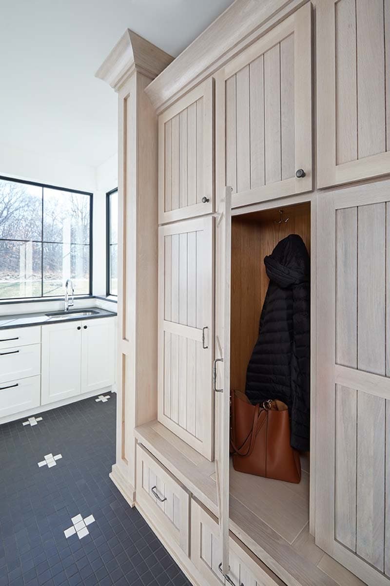 modern farmhouse mudroom locker storage with wood doors
