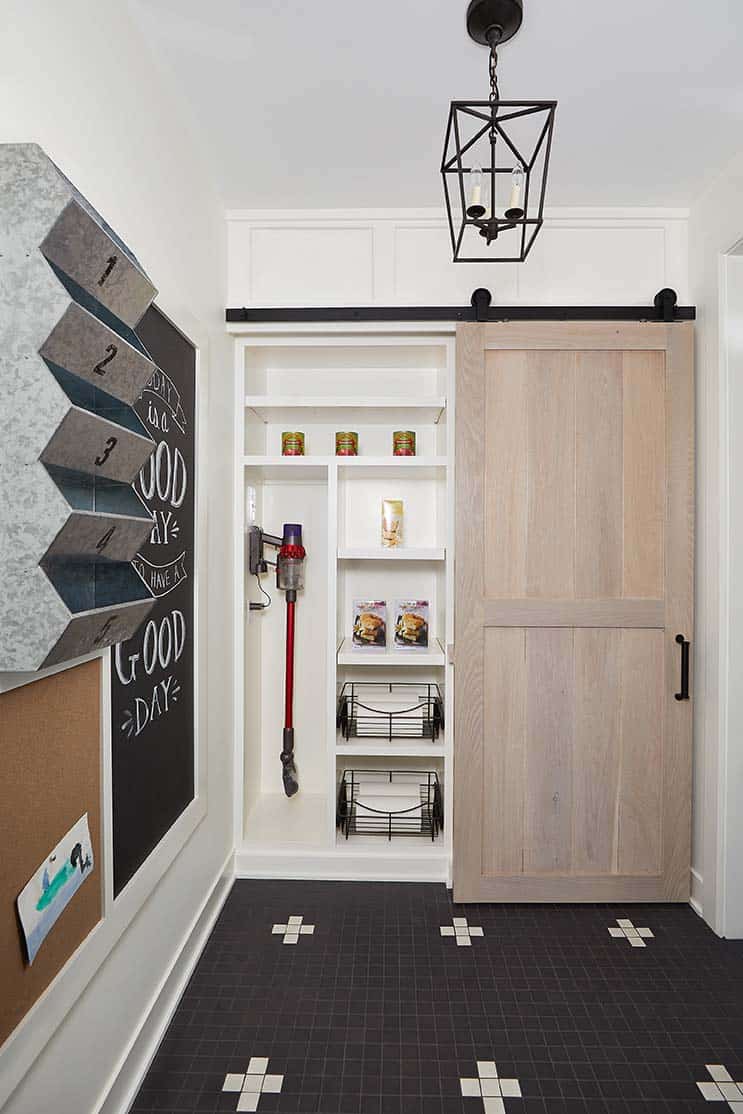 modern farmhouse walk-in pantry with a sliding door
