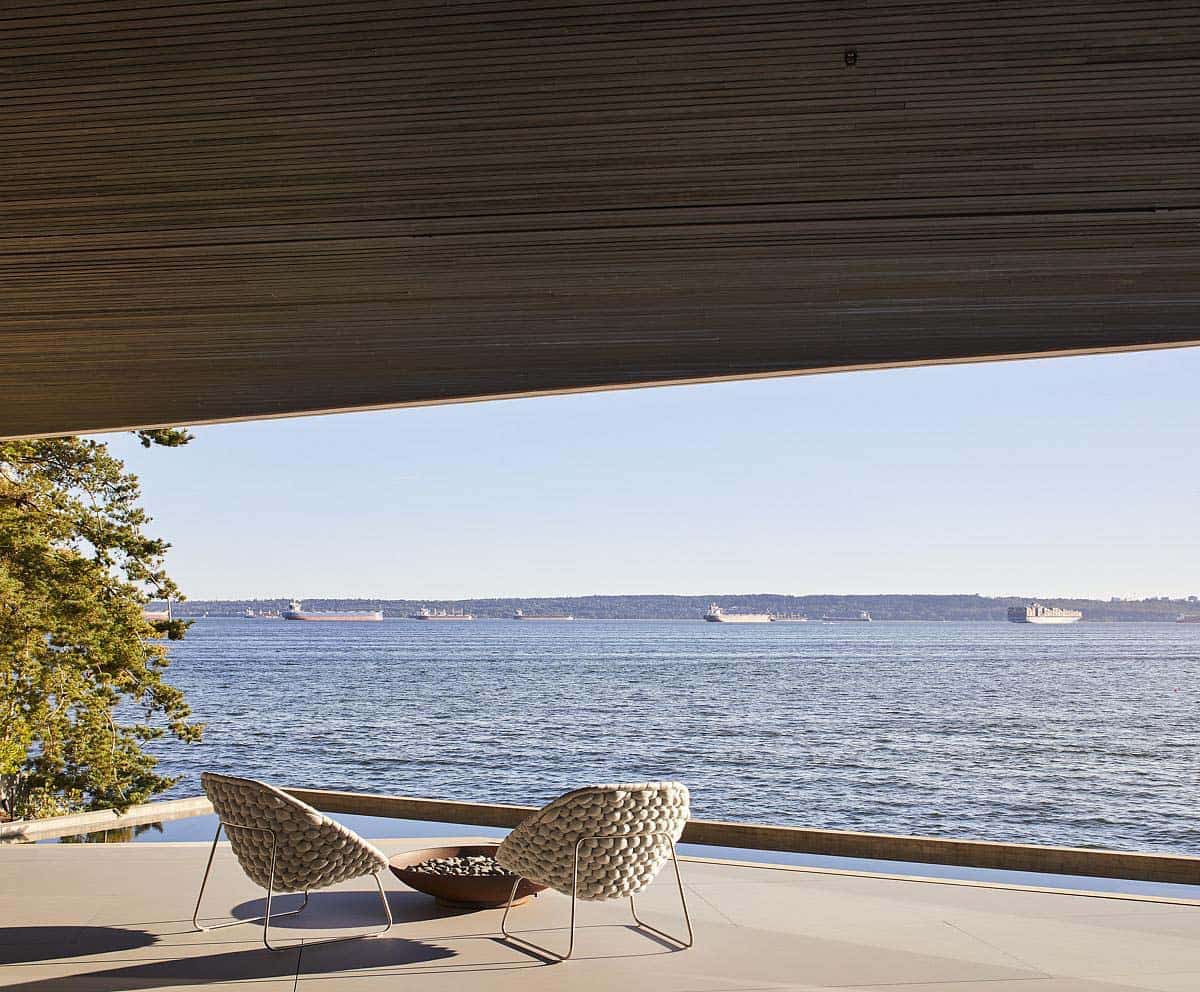 modern home covered patio with a view of the ocean