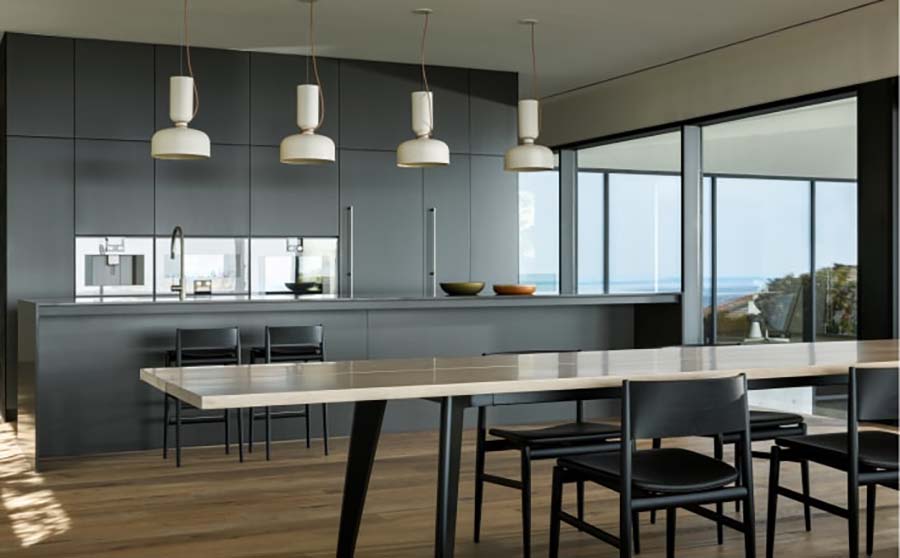 modern dining room open to the kitchen