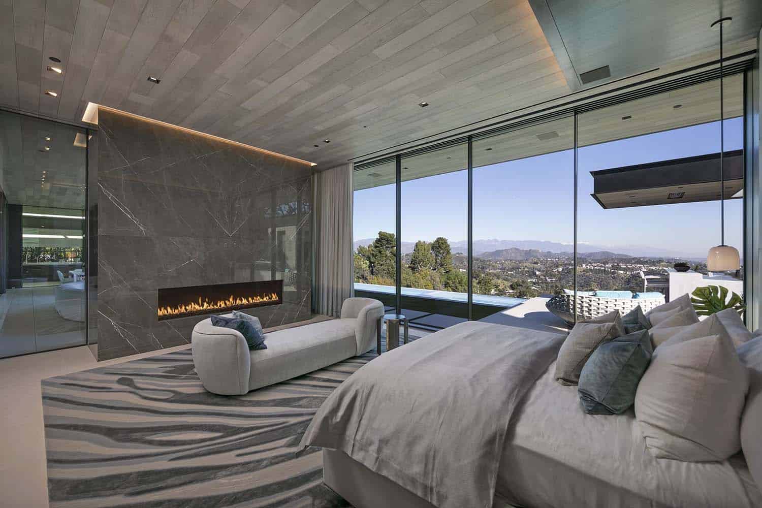 modern bedroom with a fireplace 