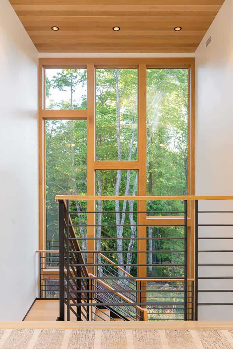 modern staircase with a large window