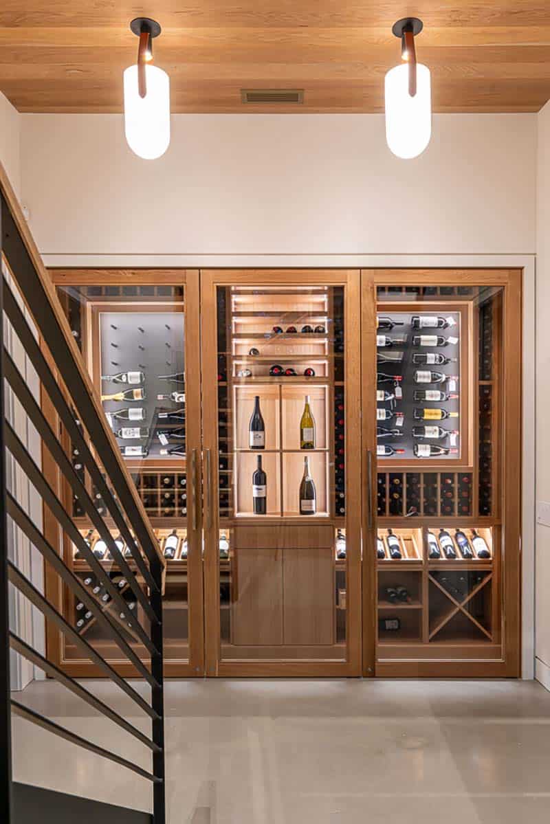modern staircase leading to the wine cellar
