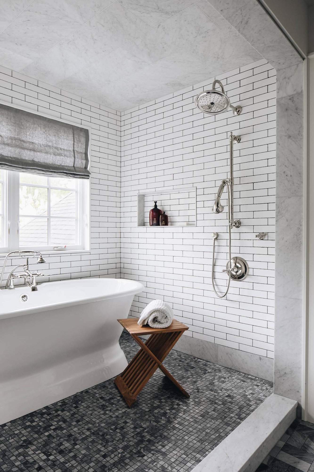 modern Scandinavian bathroom with a freestanding tub